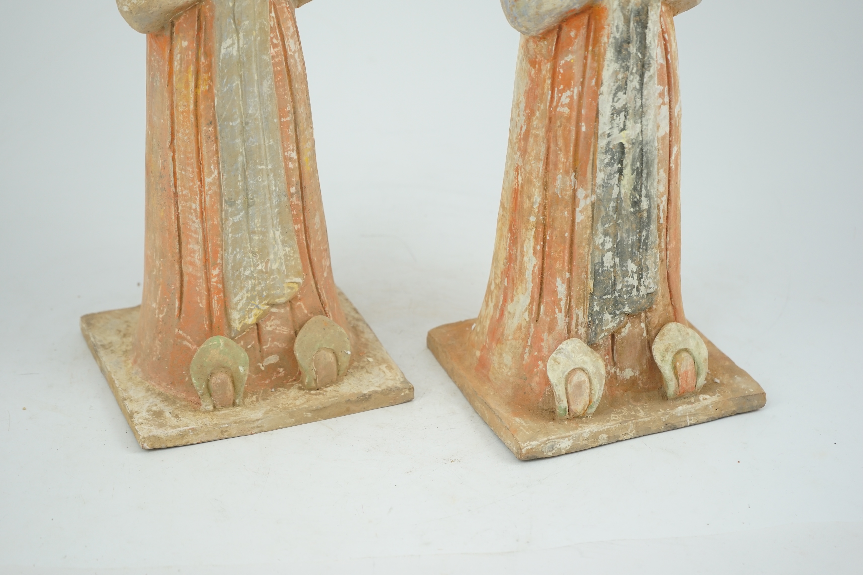 A pair of Chinese Tang style painted pottery ladies, 44.5cm